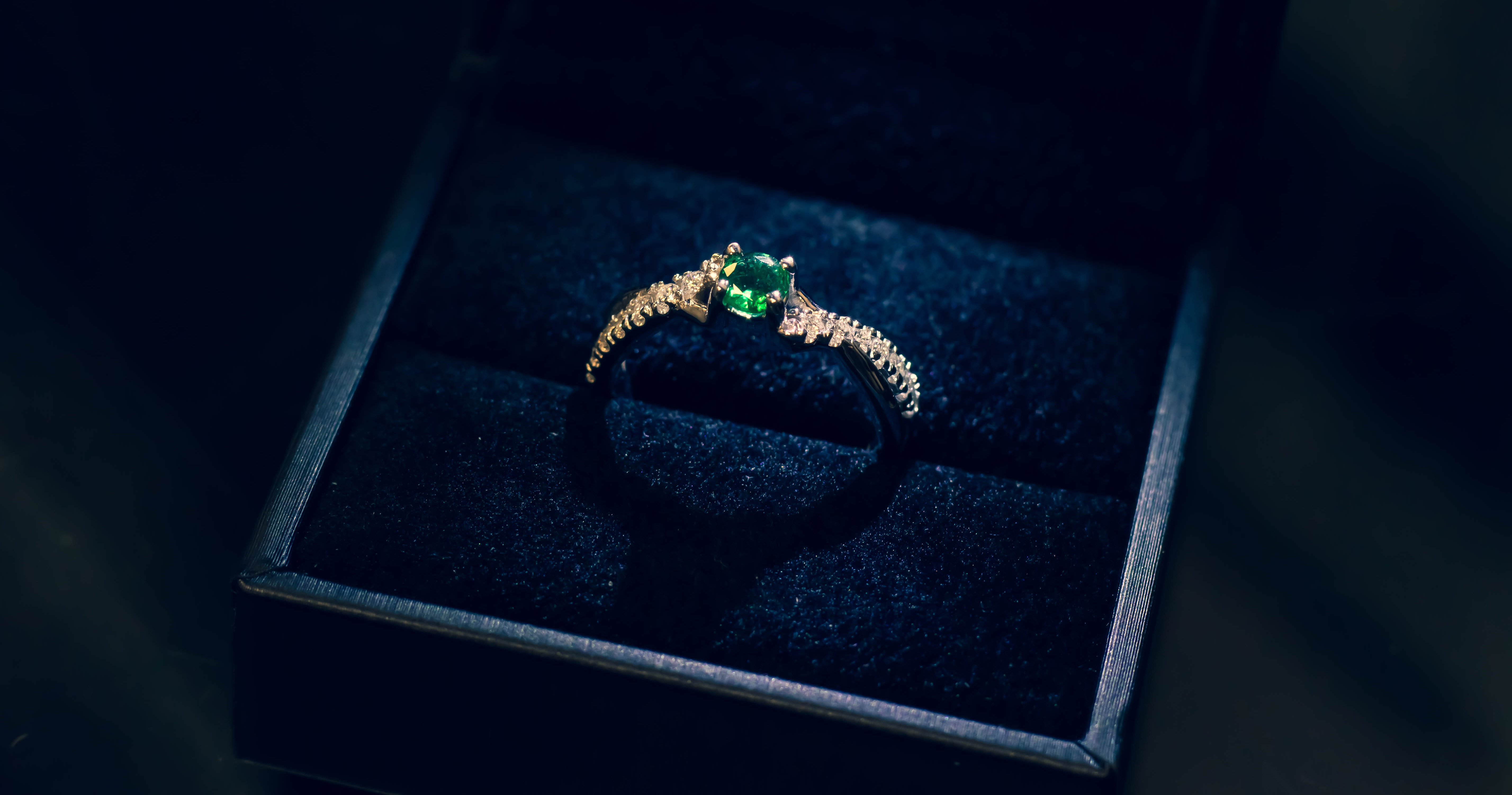 Emerald ring on a giftbox